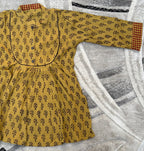 Mustard botanical pleated tunic